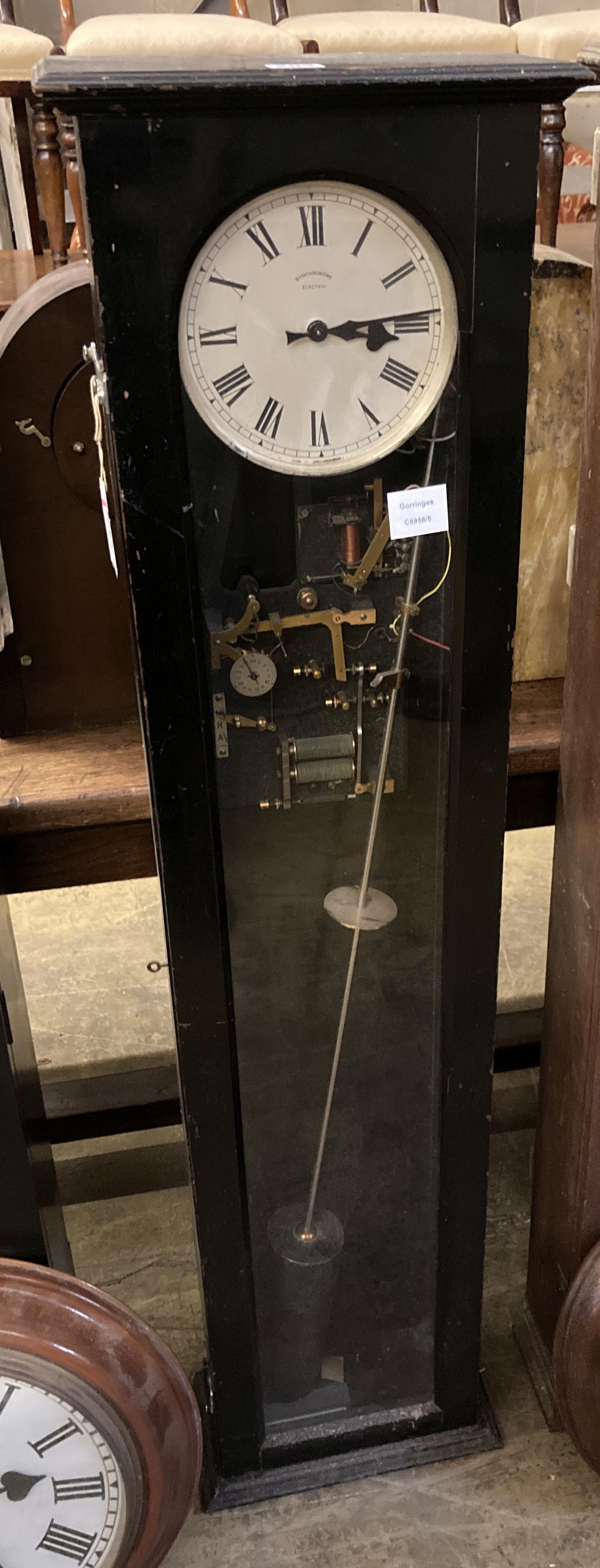 A Synchronome electric pendulum master clock, in an ebonised case, height 128cm